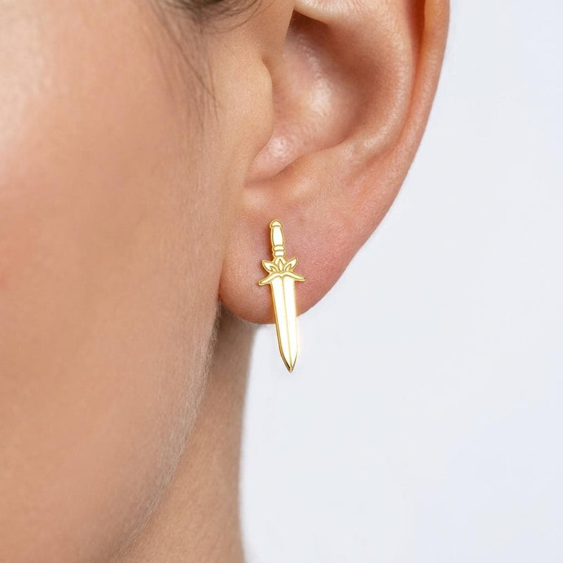 Pair of slim dagger stud earrings in gold pointing downward (2 of 6)