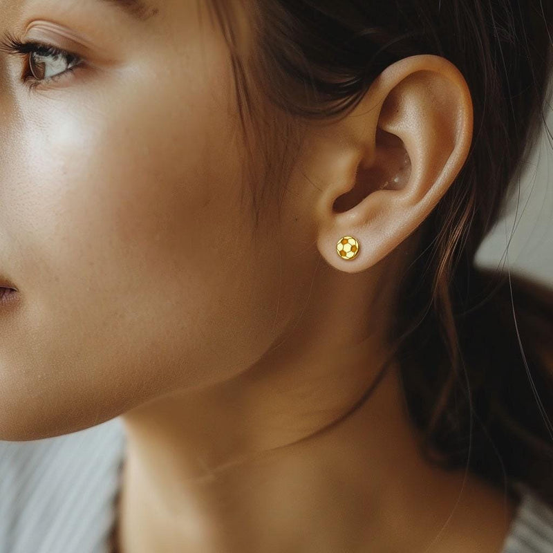 Pair of tiny round gold soccer ball stud earrings with cut in panels (5 of 9)