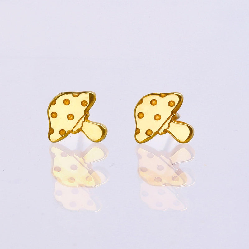 Pair of tiny gold mushroom stud earrings with spotted caps on white (9 of 10)
