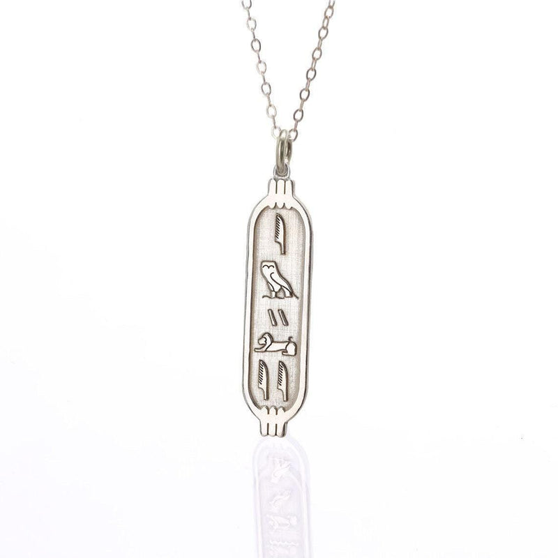 Elongated gold cartouche pendant on a fine cable chain, shown on white (6 of 11)