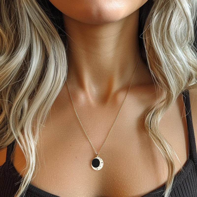 Round gold eclipse pendant with a bright outer ring on a fine chain (2 of 10)