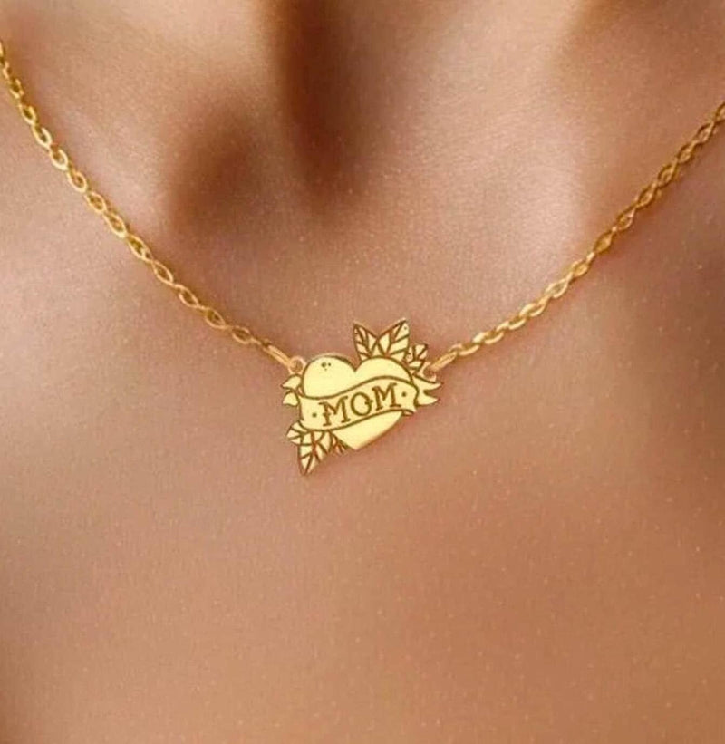 Tattoo style heart pendant with a banner on a thin gold chain (9 of 9)