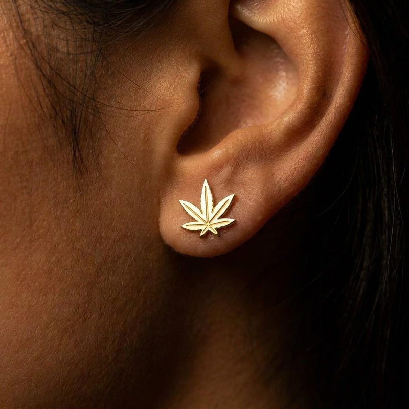 Pair of small gold marijuana leaf stud earrings with seven points (2 of 12)