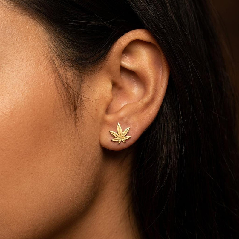 Pair of small gold marijuana leaf stud earrings with seven points (3 of 12)