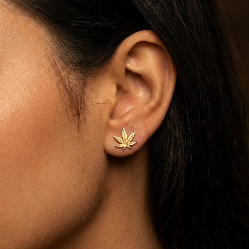 Pair of small gold marijuana leaf stud earrings with seven points (6 of 12)