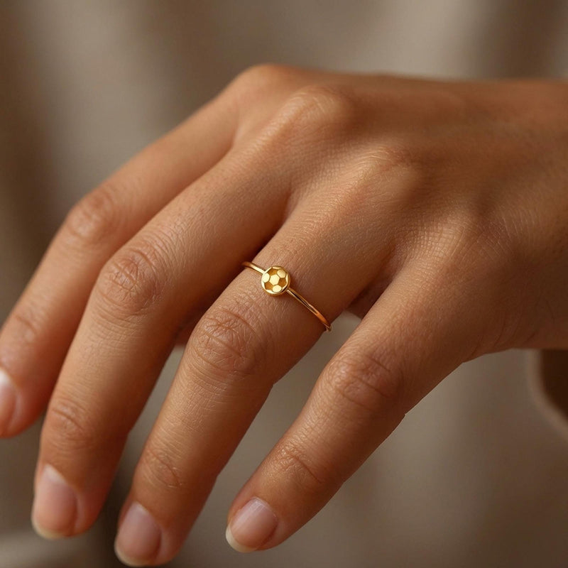 Dainty gold ring with a tiny soccer ball on a slim round band (5 of 10)