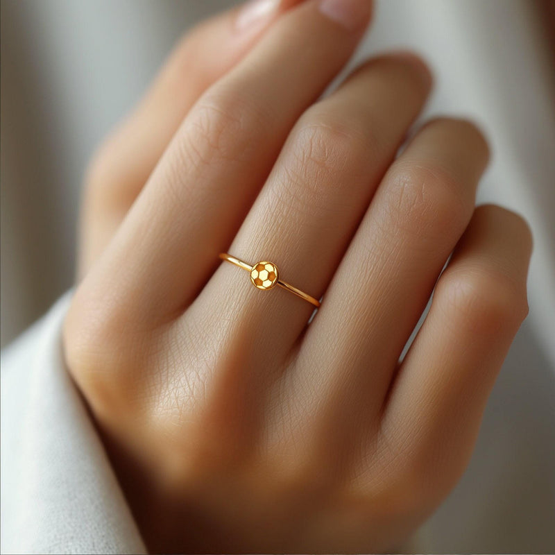 Dainty gold ring with a tiny soccer ball on a slim round band (8 of 10)