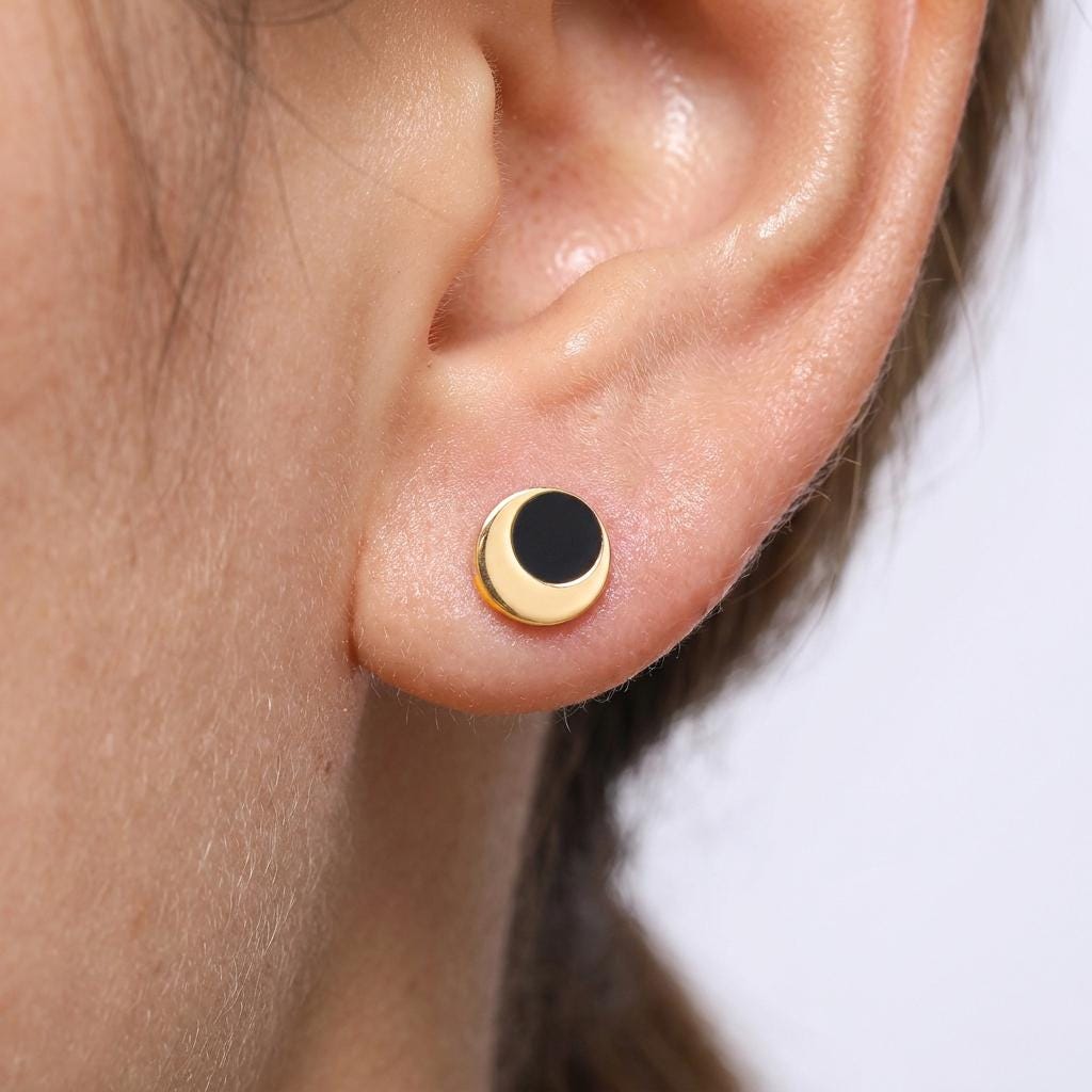Pair of tiny gold eclipse stud earrings with one disc overlapping another (2 of 7)