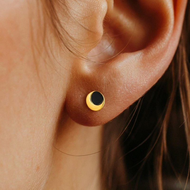 Pair of tiny gold eclipse stud earrings with one disc overlapping another (3 of 7)