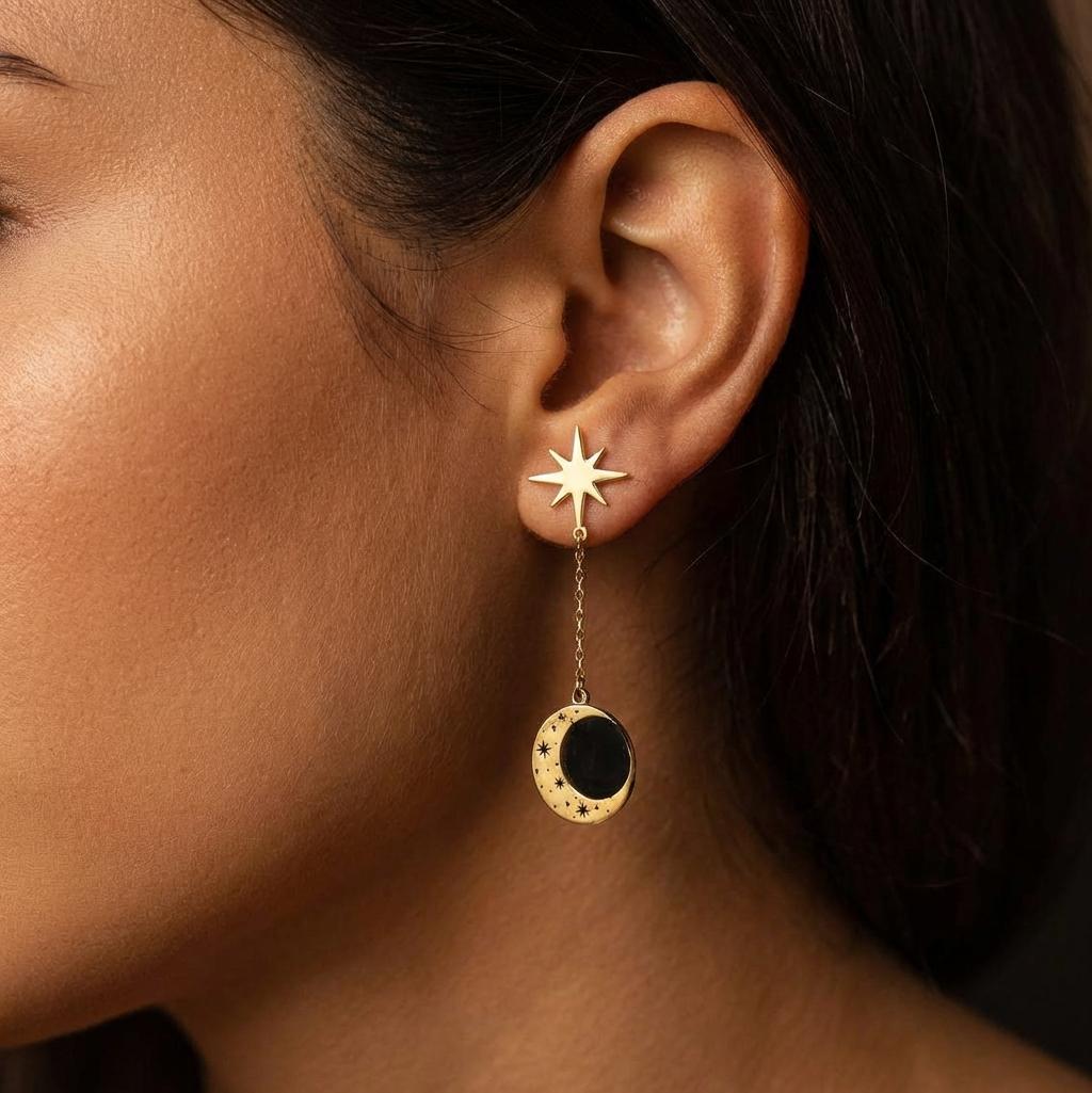 Gold crescent moon earrings with a small star hanging below, shown as a pair (2 of 8)