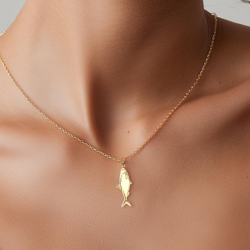Dainty gold sardine charm necklace with a detailed fish on a fine chain (11 of 11)