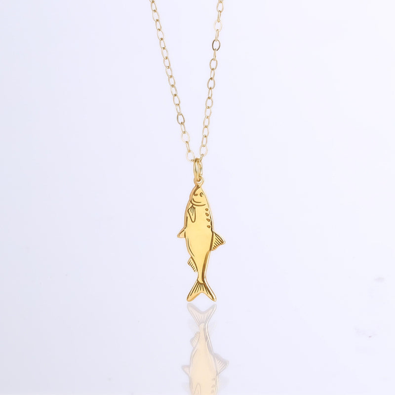 Dainty gold sardine charm necklace with a detailed fish on a fine chain (7 of 11)