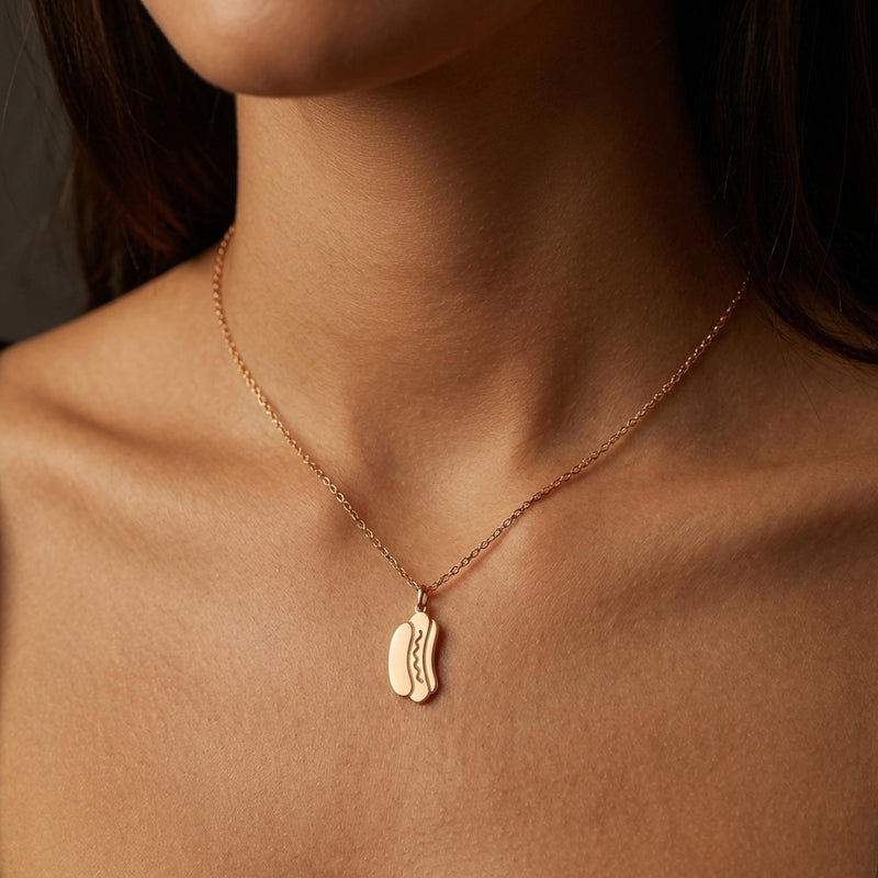 Small gold hotdog pendant with mustard zigzag on a thin cable chain (4 of 9)