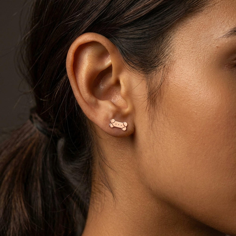 Pair of narrow gold dog bone stud earrings (5 of 11)