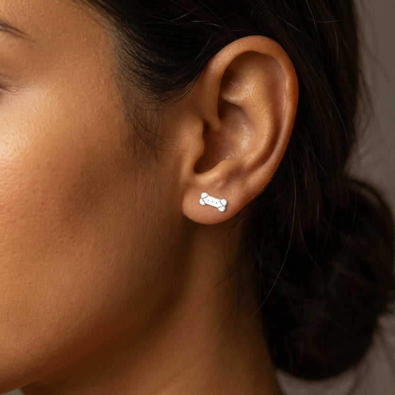 Pair of narrow gold dog bone stud earrings (7 of 11)