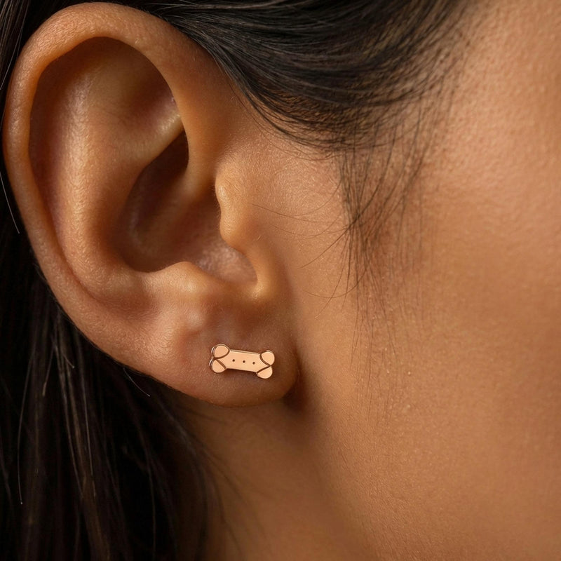 Pair of narrow gold dog bone stud earrings (8 of 11)