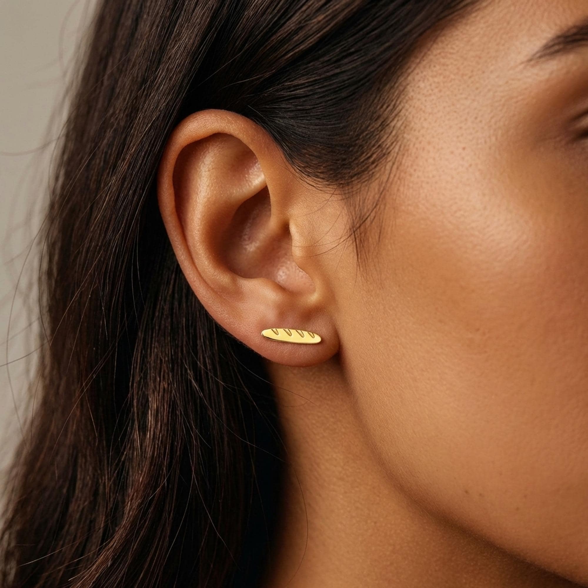Pair of slim gold baguette bread stud earrings with scored tops (2 of 11)