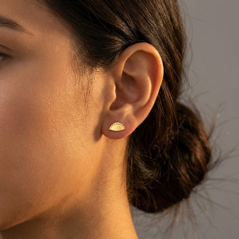 Pair of small gold empanada stud earrings shaped as half moons with crimped edges. (3 of 8)