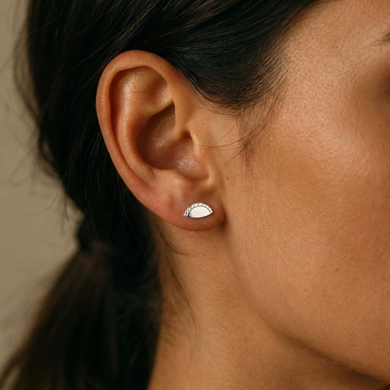 Pair of small gold empanada stud earrings shaped as half moons with crimped edges. (4 of 8)