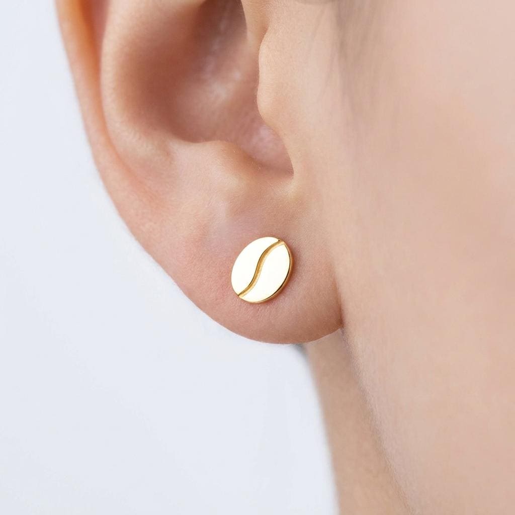 Pair of very small coffee bean stud earrings in gold with a center seam (2 of 10)
