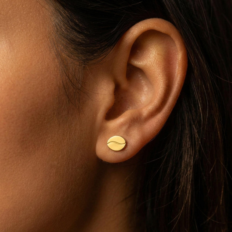 Pair of very small coffee bean stud earrings in gold with a center seam (4 of 10)