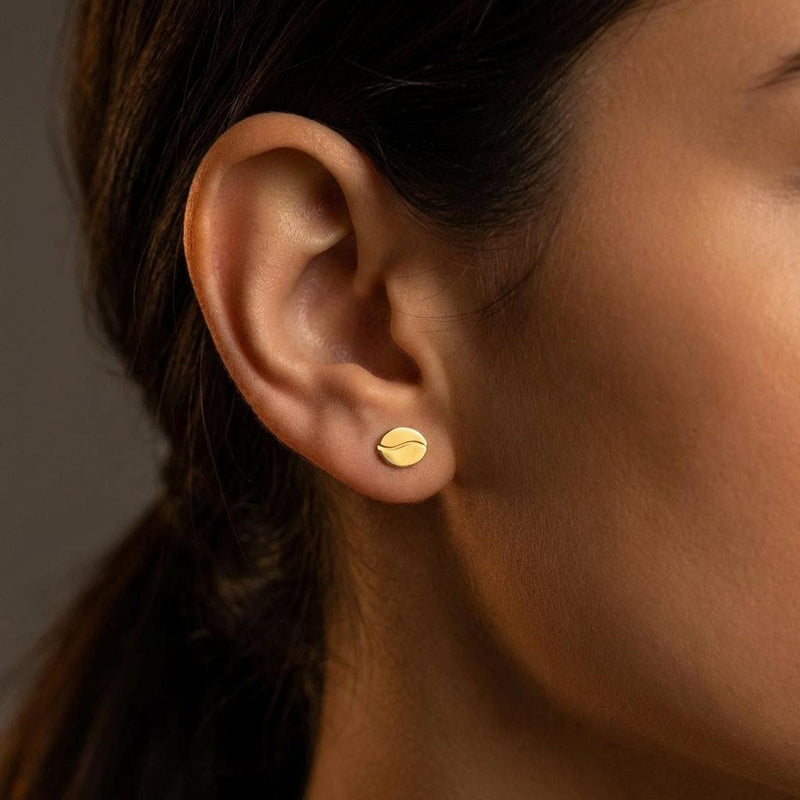 Pair of very small coffee bean stud earrings in gold with a center seam (5 of 10)