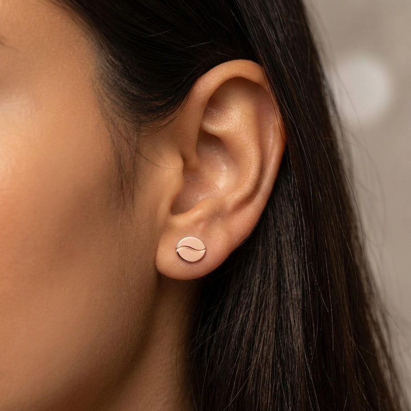 Pair of very small coffee bean stud earrings in gold with a center seam (7 of 10)