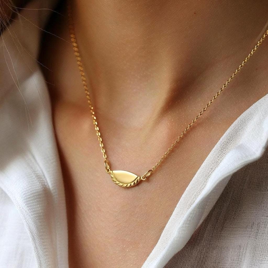 Gold empanada pendant with a crimped edge on a fine cable chain. (2 of 7)