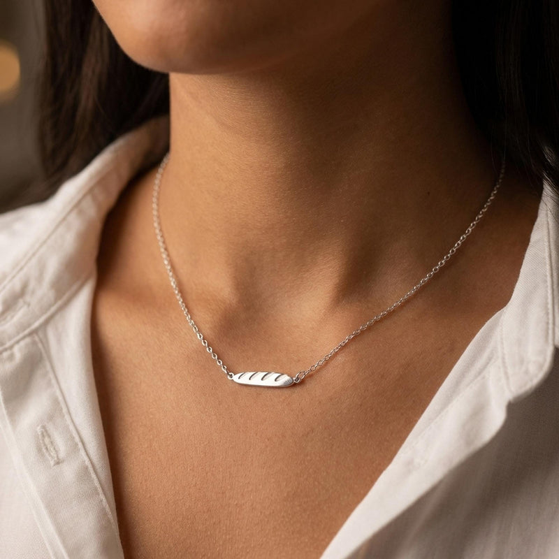 Tiny gold baguette bread pendant with scored top on a fine chain (2 of 11)