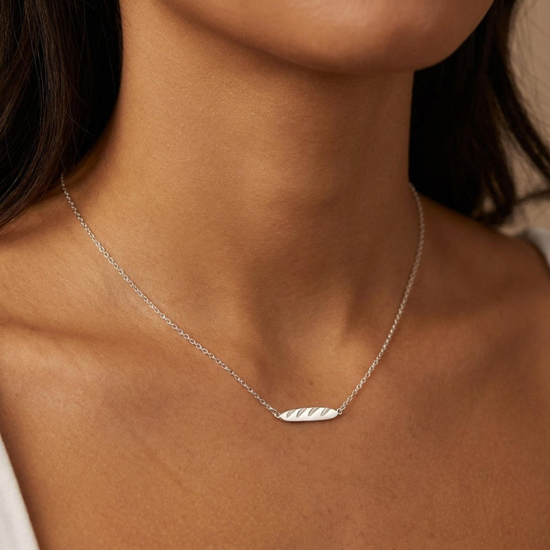 Tiny gold baguette bread pendant with scored top on a fine chain (4 of 11)
