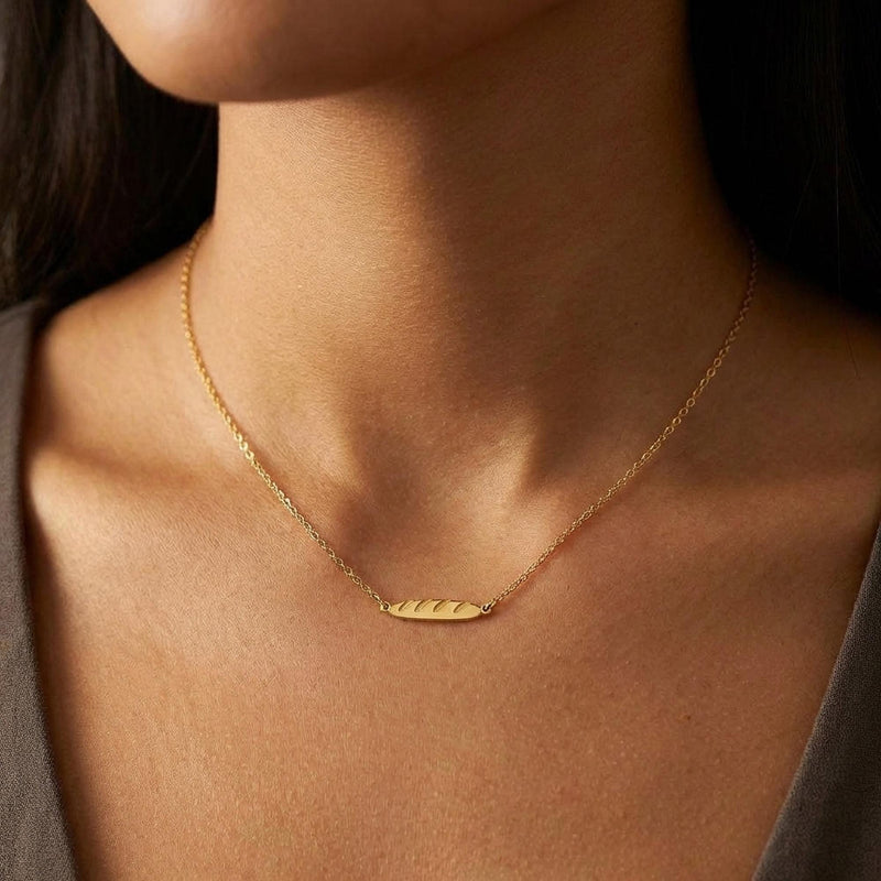 Tiny gold baguette bread pendant with scored top on a fine chain (5 of 11)