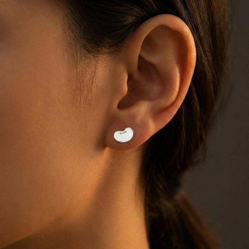 Pair of small kidney bean shaped stud earrings in polished gold (13 of 13)