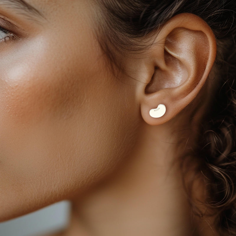 Pair of small kidney bean shaped stud earrings in polished gold (7 of 13)