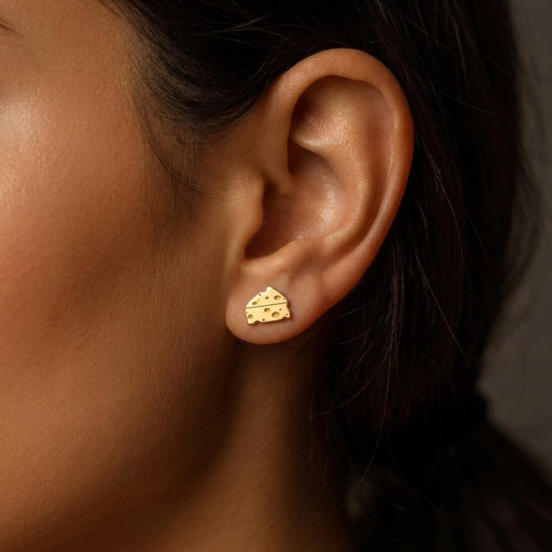 Small gold cheese wedge stud earrings with cutout holes, shown as a pair (3 of 12)