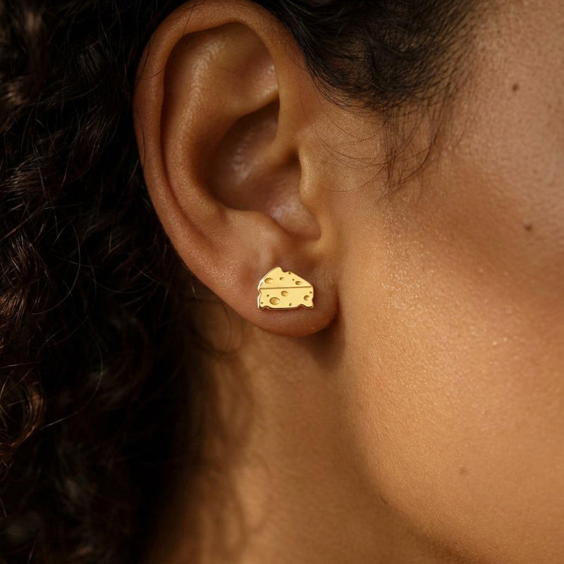 Small gold cheese wedge stud earrings with cutout holes, shown as a pair (4 of 12)
