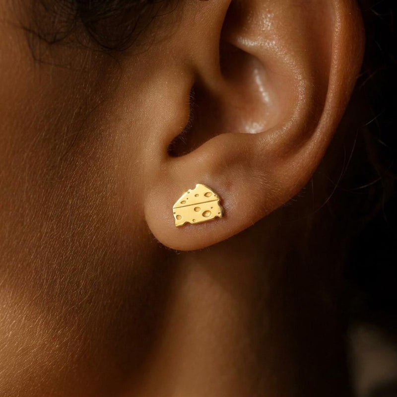 Small gold cheese wedge stud earrings with cutout holes, shown as a pair (8 of 12)