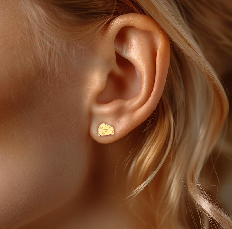 Small gold cheese wedge stud earrings with cutout holes, shown as a pair (9 of 12)