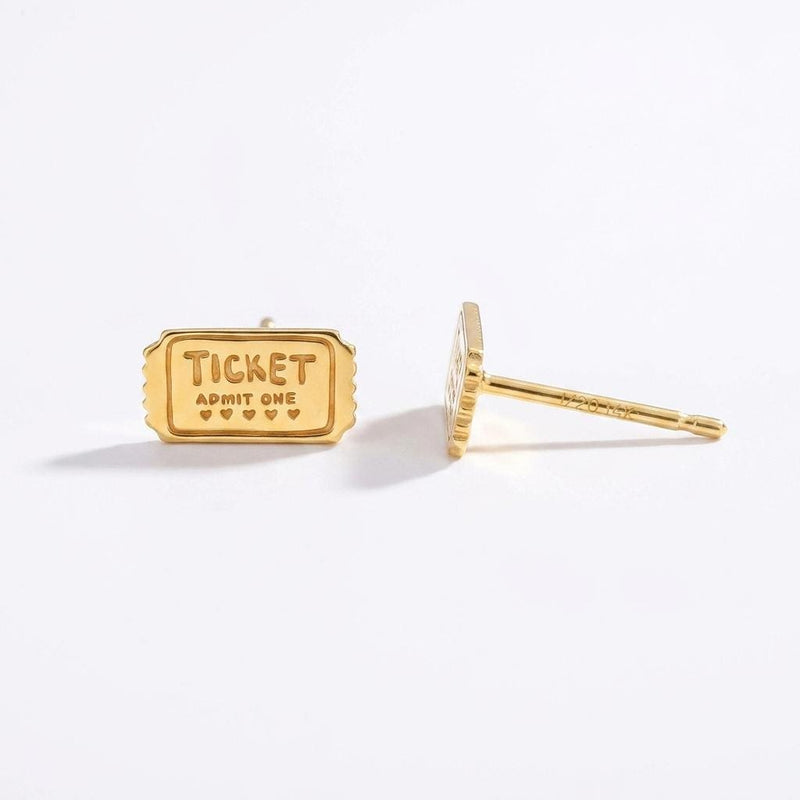 Pair of small gold movie ticket stud earrings with a perforated edge