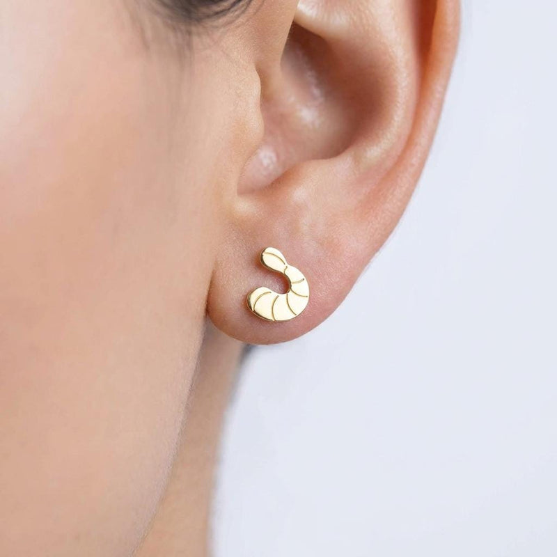 Pair of small gold shrimp stud earrings with curled tails and segmented shells