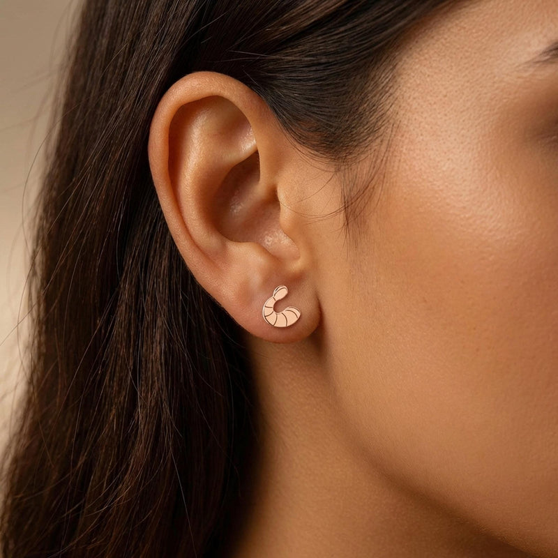 Pair of small gold shrimp stud earrings with curled tails and segmented shells (4 of 9)