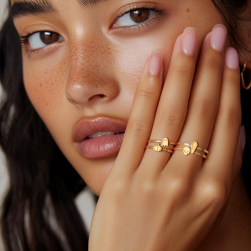 Thin gold stacking ring with a small flat coffin shape on top (14 of 14)