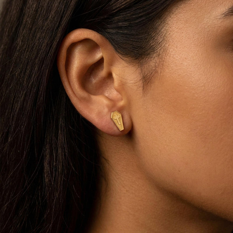 Pair of narrow gold coffin stud earrings with a raised cross on each lid (10 of 13)