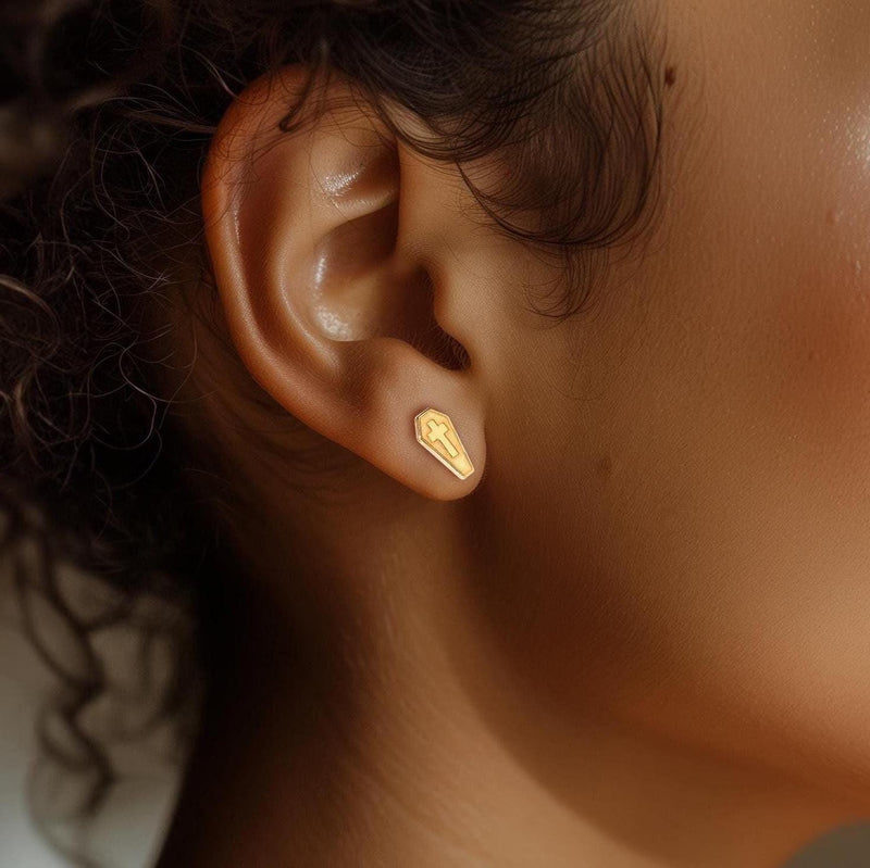 Pair of narrow gold coffin stud earrings with a raised cross on each lid (13 of 13)