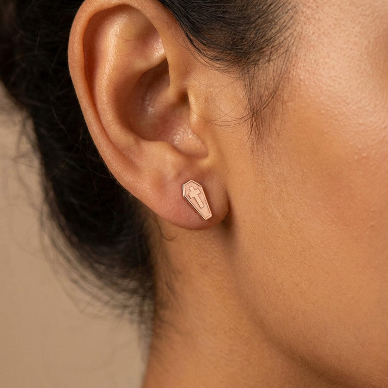 Pair of narrow gold coffin stud earrings with a raised cross on each lid (4 of 13)