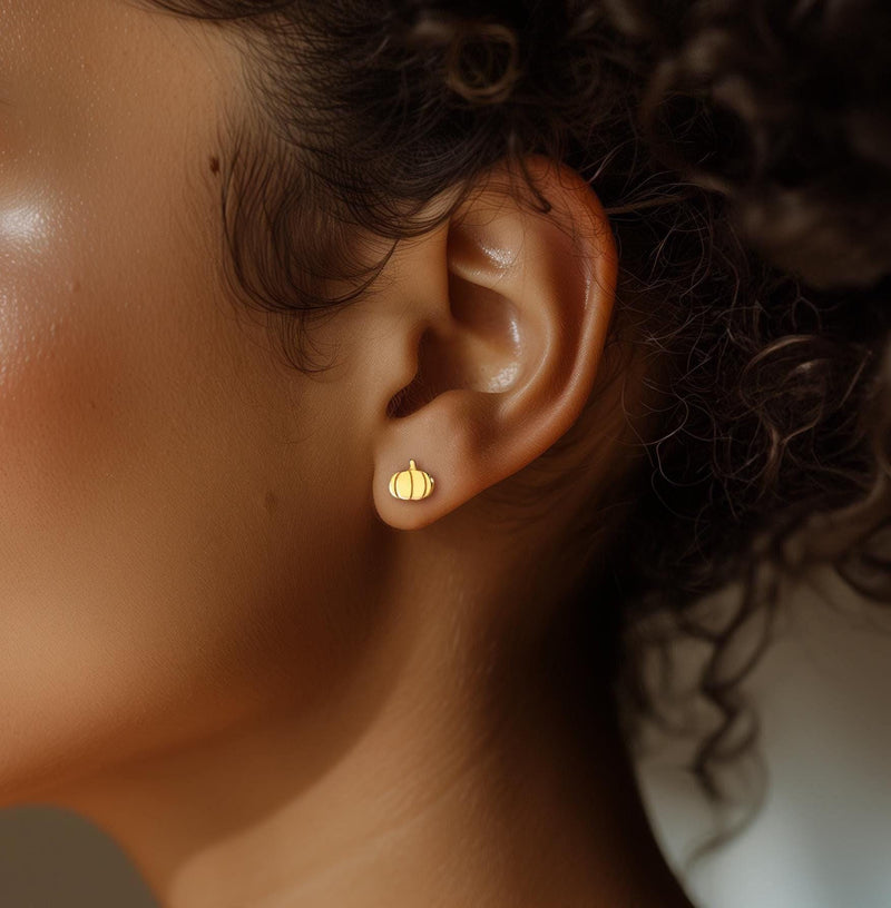 Pair of very small gold pumpkin stud earrings with curled stems (4 of 10)