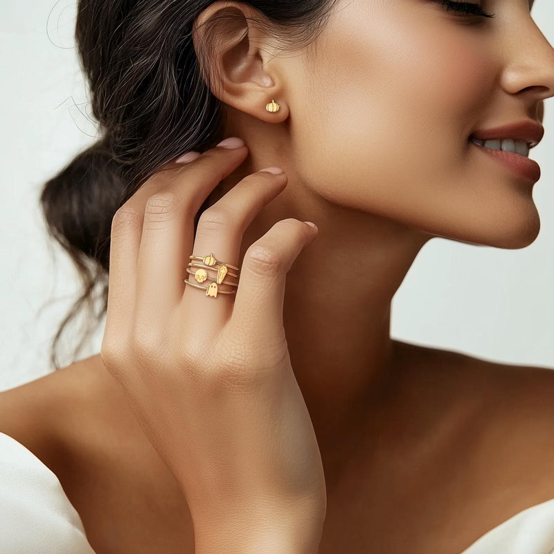 Set of thin gold Halloween stacking rings with small spooky motifs (3 of 11)