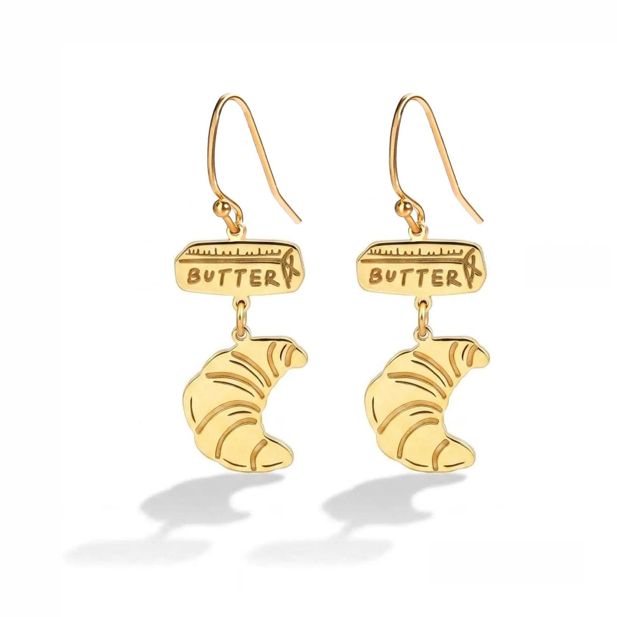 Pair of tiny gold croissant stud earrings with scored rolled pastry detail
