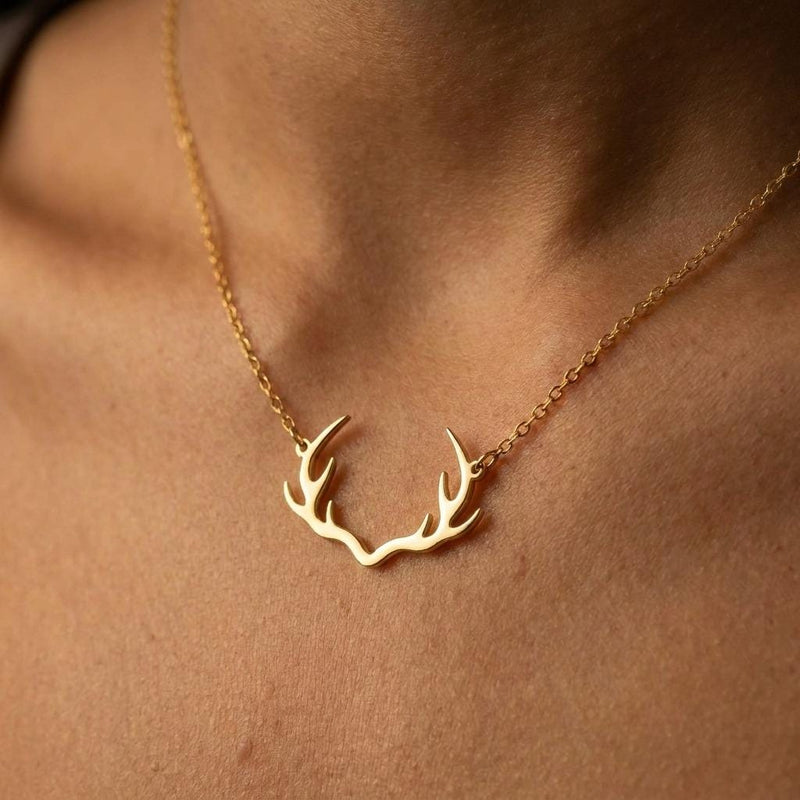 Gold deer antler pendant with visible tines on a thin cable chain (2 of 11)