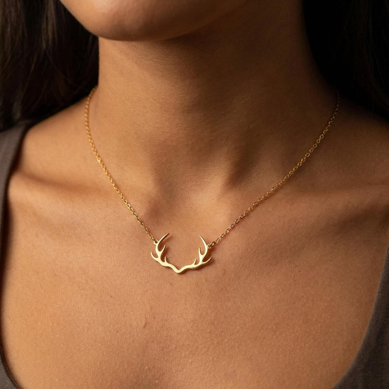 Gold deer antler pendant with visible tines on a thin cable chain (3 of 11)