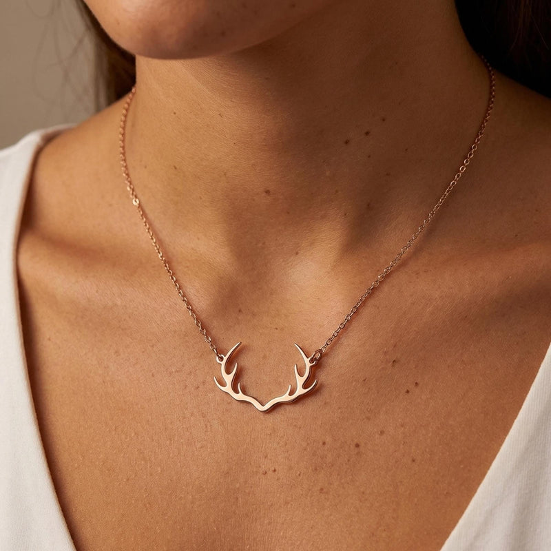 Gold deer antler pendant with visible tines on a thin cable chain (5 of 11)